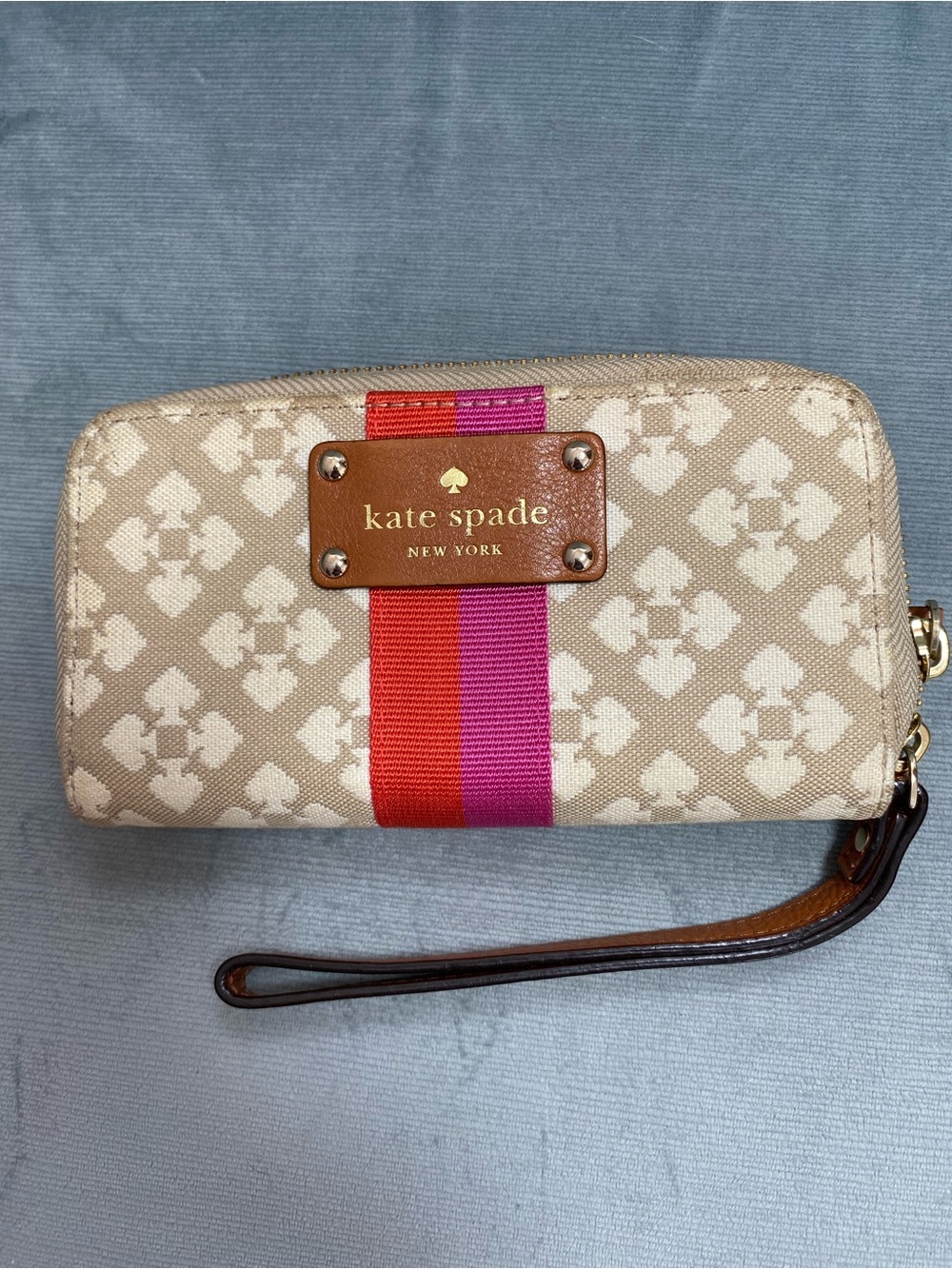 kate spade Beige Logo Wristlet with Pink and Red Center Stripe New small blemish
